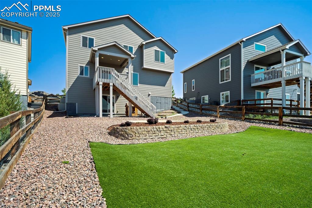 5633 Makalu Drive Colorado Springs, CO 80924 - Photo 44 of 48 a front view of a house with swimming pool