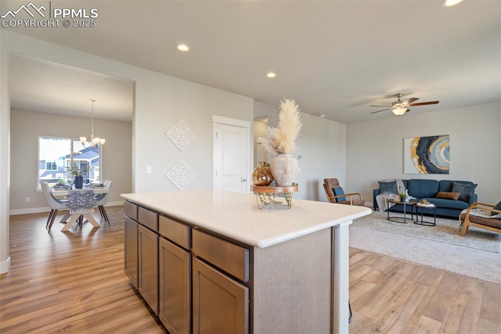 5633 Makalu Drive Colorado Springs, CO 80924 - Photo 10 of 48 a living room with furniture and wooden floor