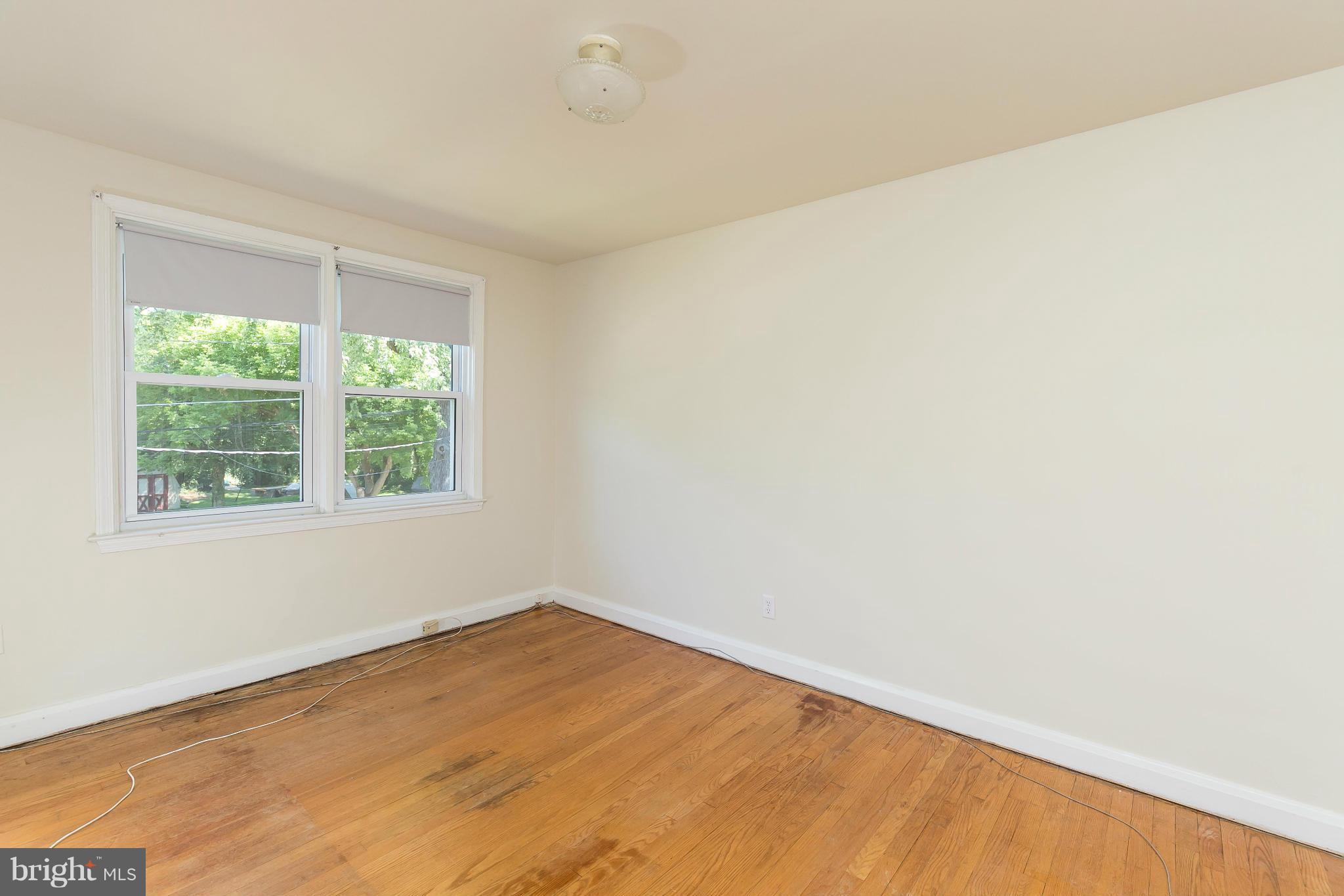 214 Stanmore Road Baltimore, MD 21212 - Photo 11 of 21 an empty room with a window