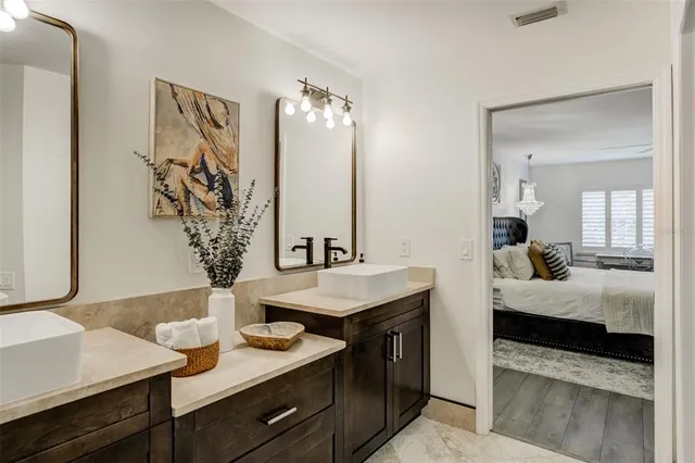 a bathroom with a tub and a shower