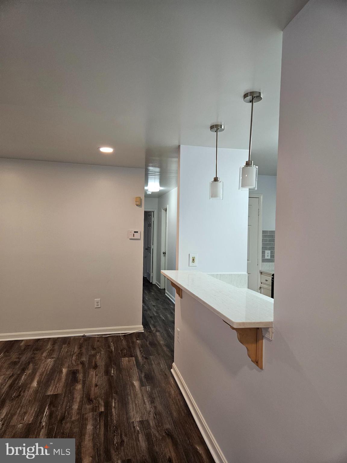 2040 Alice Avenue, Unit 2040201 Oxon Hill, MD 20745 - Photo 5 of 15 a bathroom with a sink and a shower