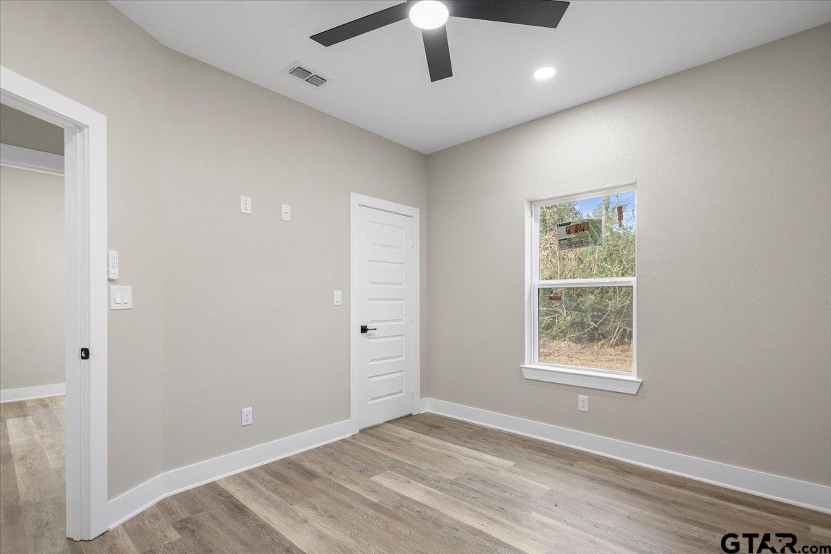 663 Caroline Bend Bullard, TX 75757 - Photo 28 of 36 a view of an empty room with a window