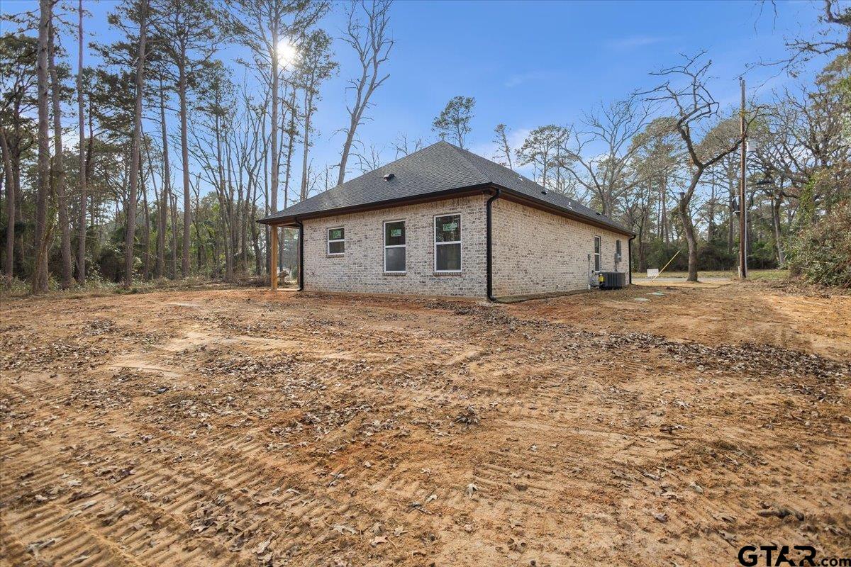 663 Caroline Bend Bullard, TX 75757 - Photo 32 of 36 a view of a house with a yard