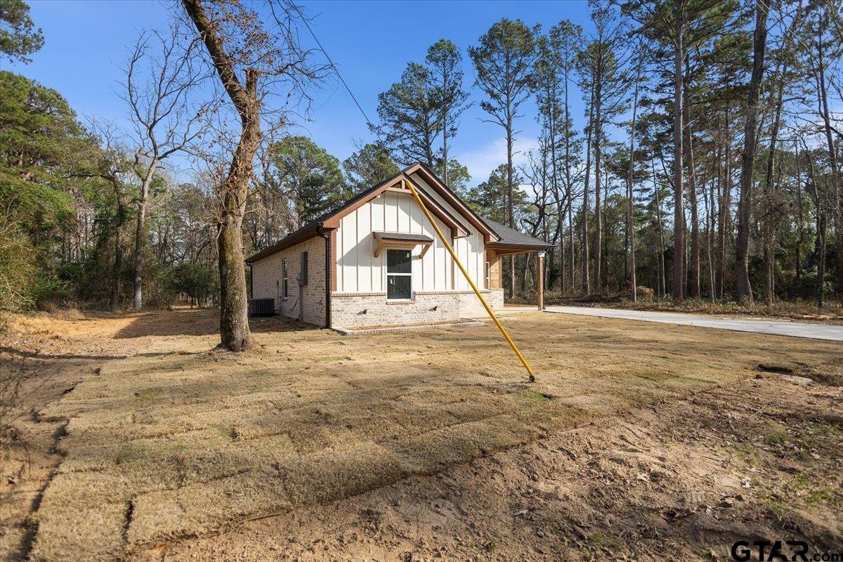 663 Caroline Bend Bullard, TX 75757 - Photo 4 of 36 a house with trees in front of it