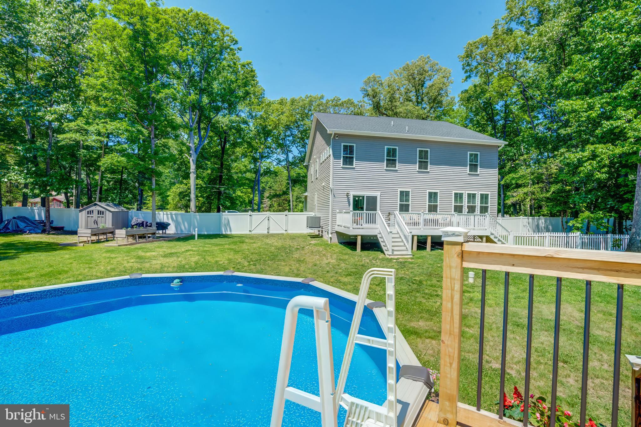 8331 Woodland Road Pasadena, MD 21122 - Photo 45 of 63 Above Ground pool with Deck