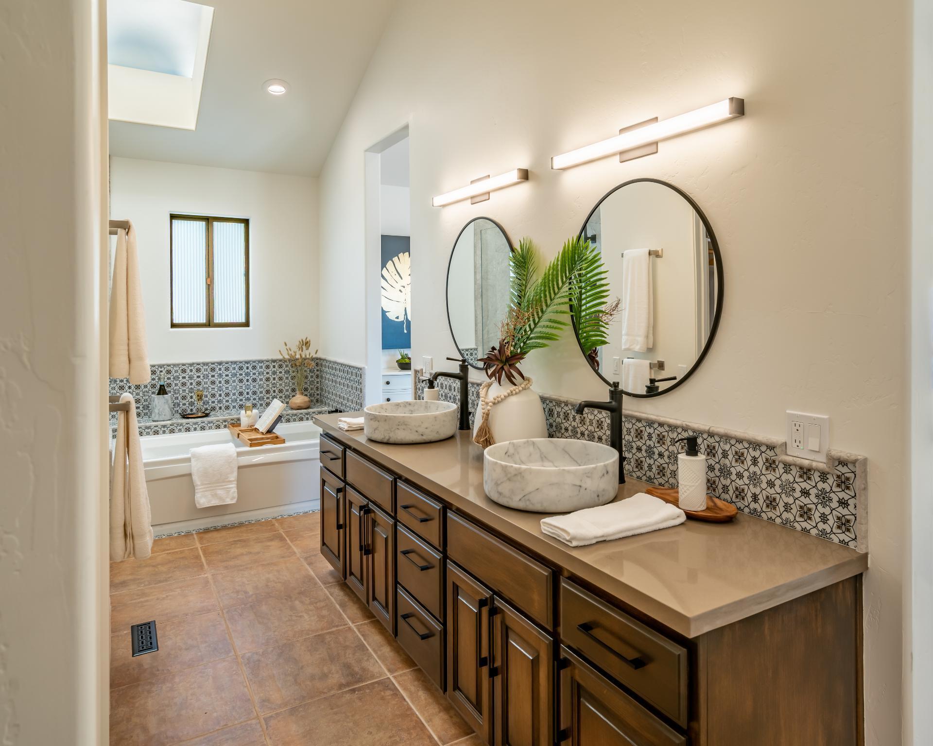 1910 Barker Pass Road Santa Barbara, CA 93108 - Photo 17 of 41 a bathroom with a sink double vanity and a mirror