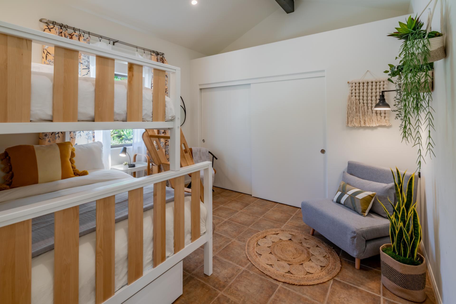 1910 Barker Pass Road Santa Barbara, CA 93108 - Photo 22 of 41 a bedroom with furniture and a window