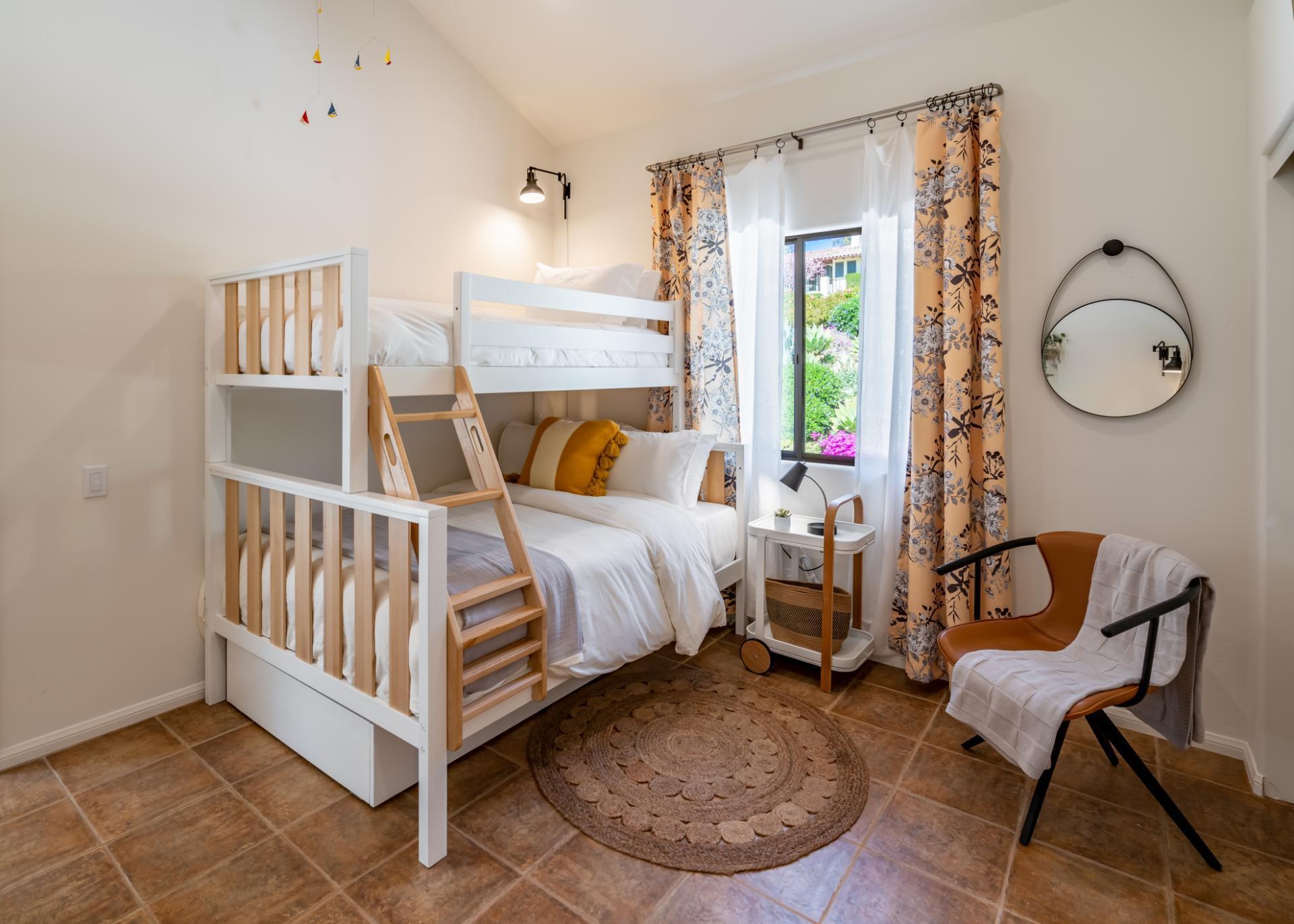 1910 Barker Pass Road Santa Barbara, CA 93108 - Photo 23 of 41 a bed room with a bed and a chair