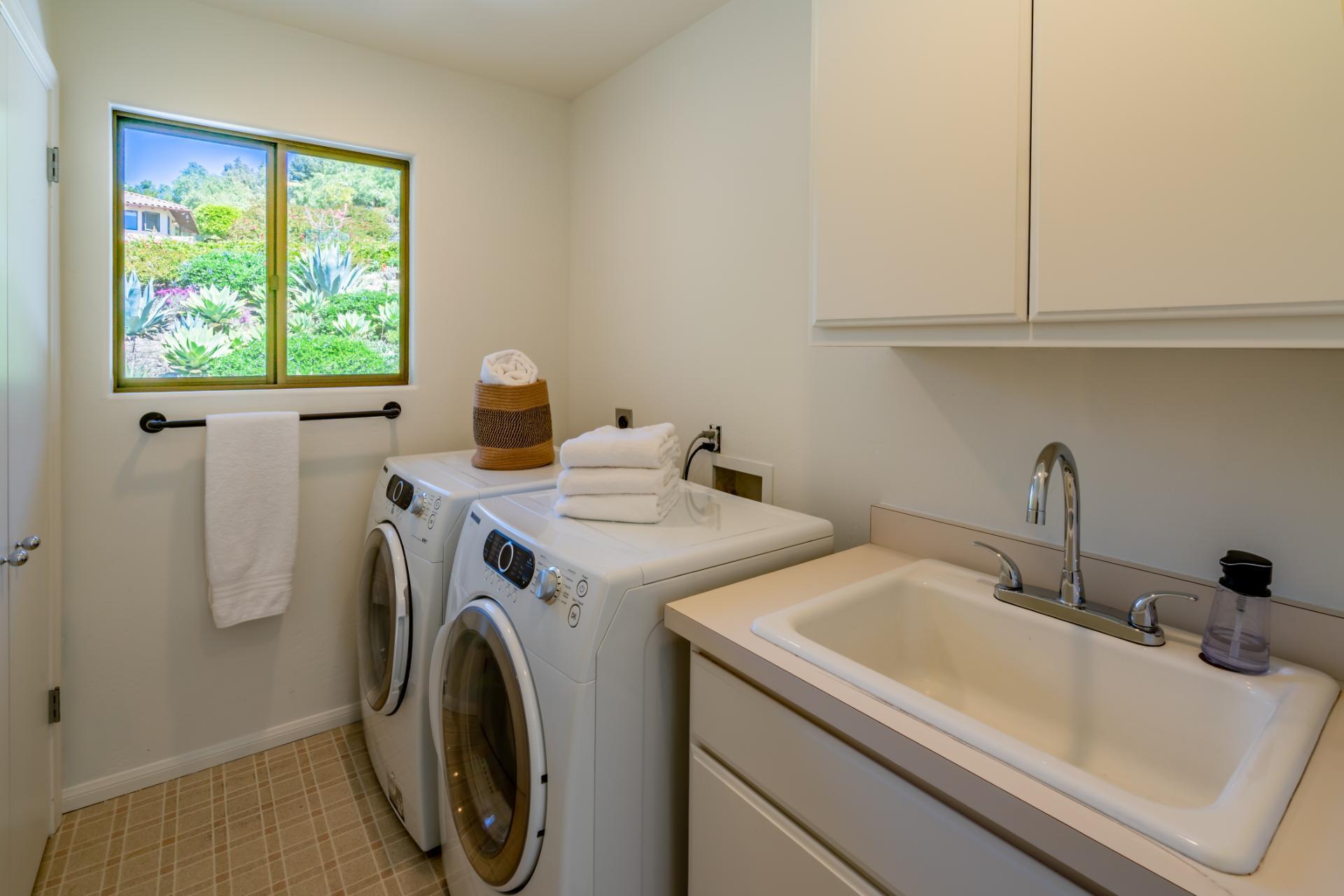 1910 Barker Pass Road Santa Barbara, CA 93108 - Photo 25 of 41 a utility room with dryer and washer