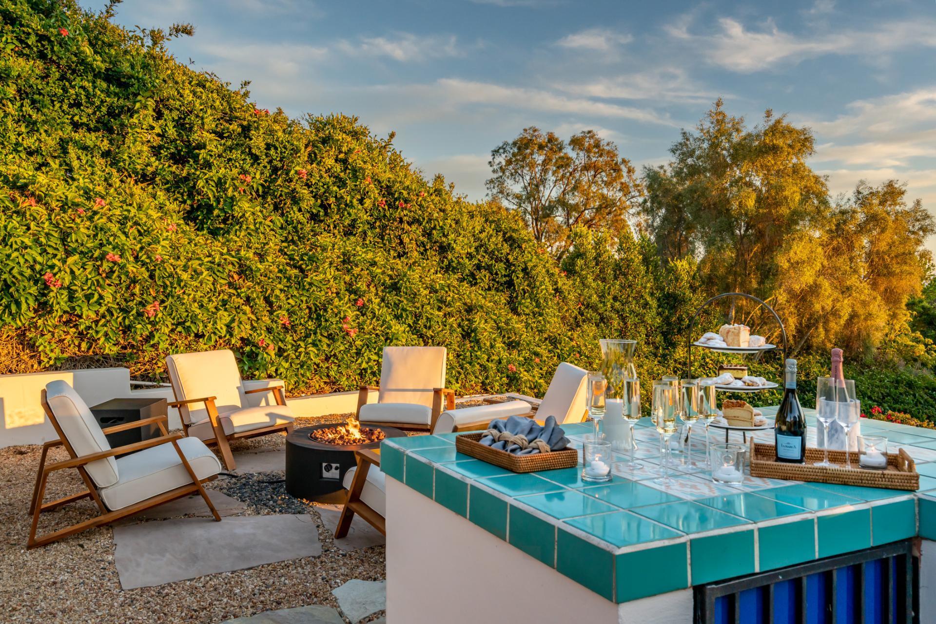 1910 Barker Pass Road Santa Barbara, CA 93108 - Photo 26 of 41 a view of a backyard with sitting area
