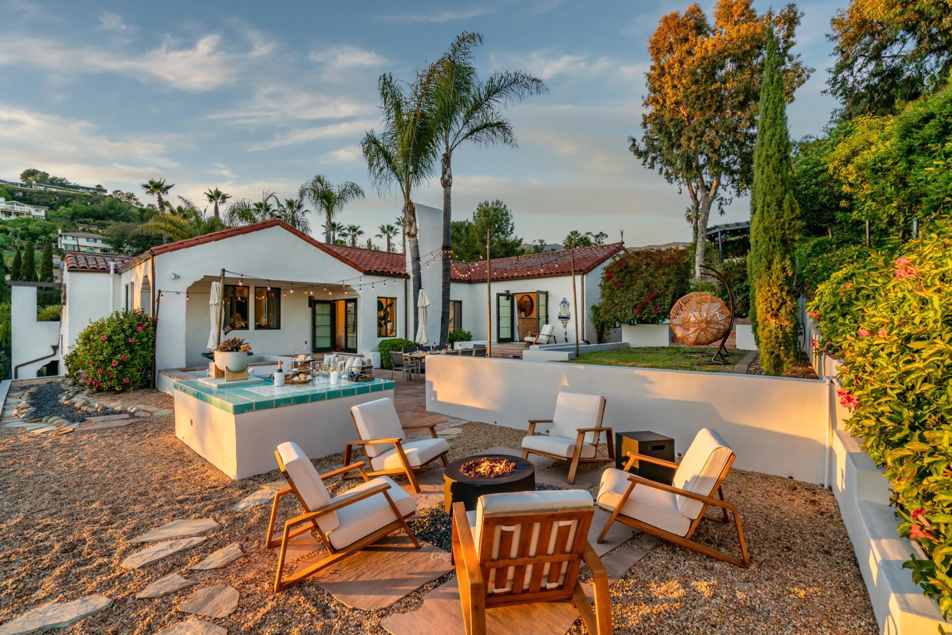 1910 Barker Pass Road Santa Barbara, CA 93108 - Photo 27 of 41 a view of house with swimming pool outdoor seating area