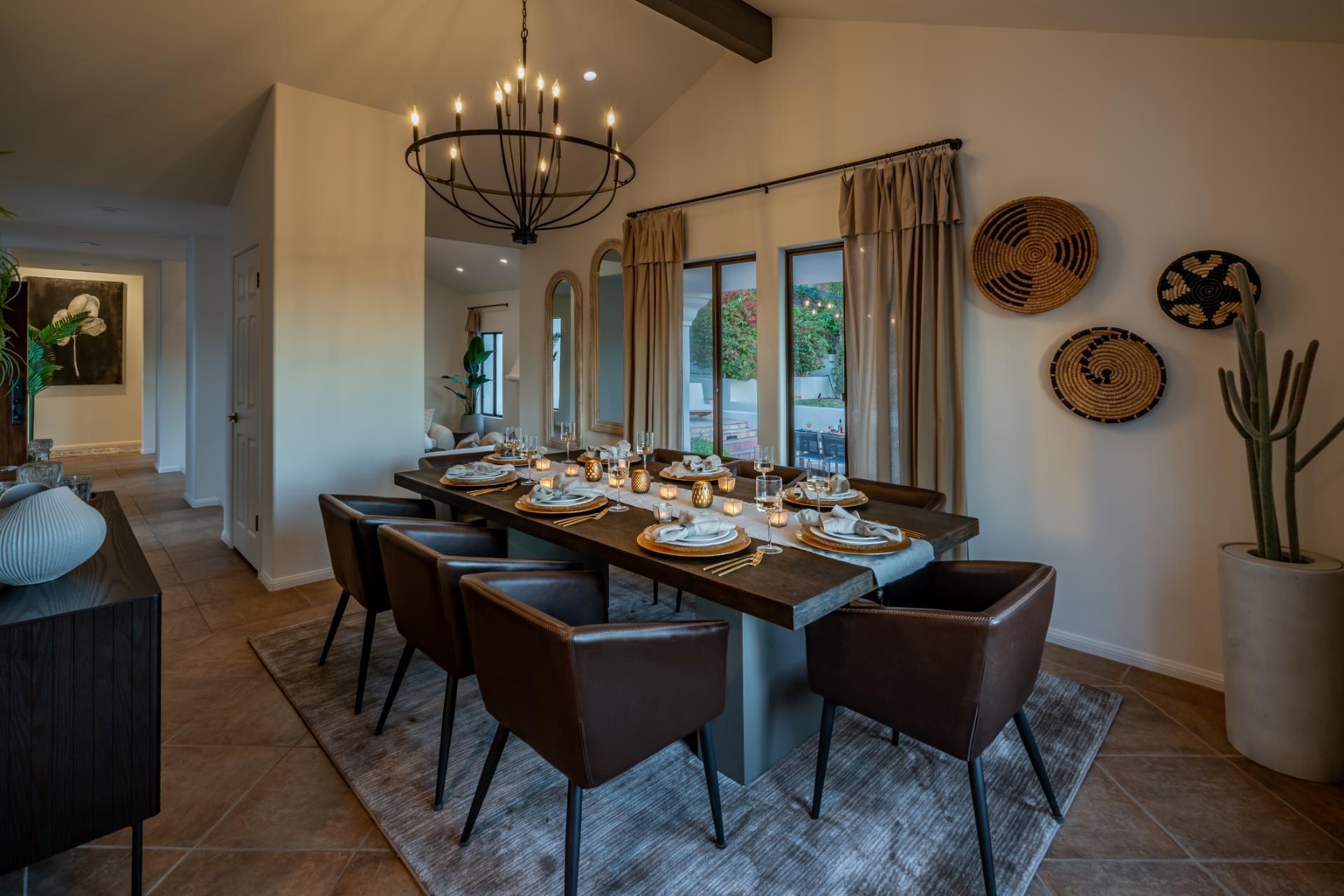1910 Barker Pass Road Santa Barbara, CA 93108 - Photo 30 of 41 a view of a dining room with furniture and chandelier