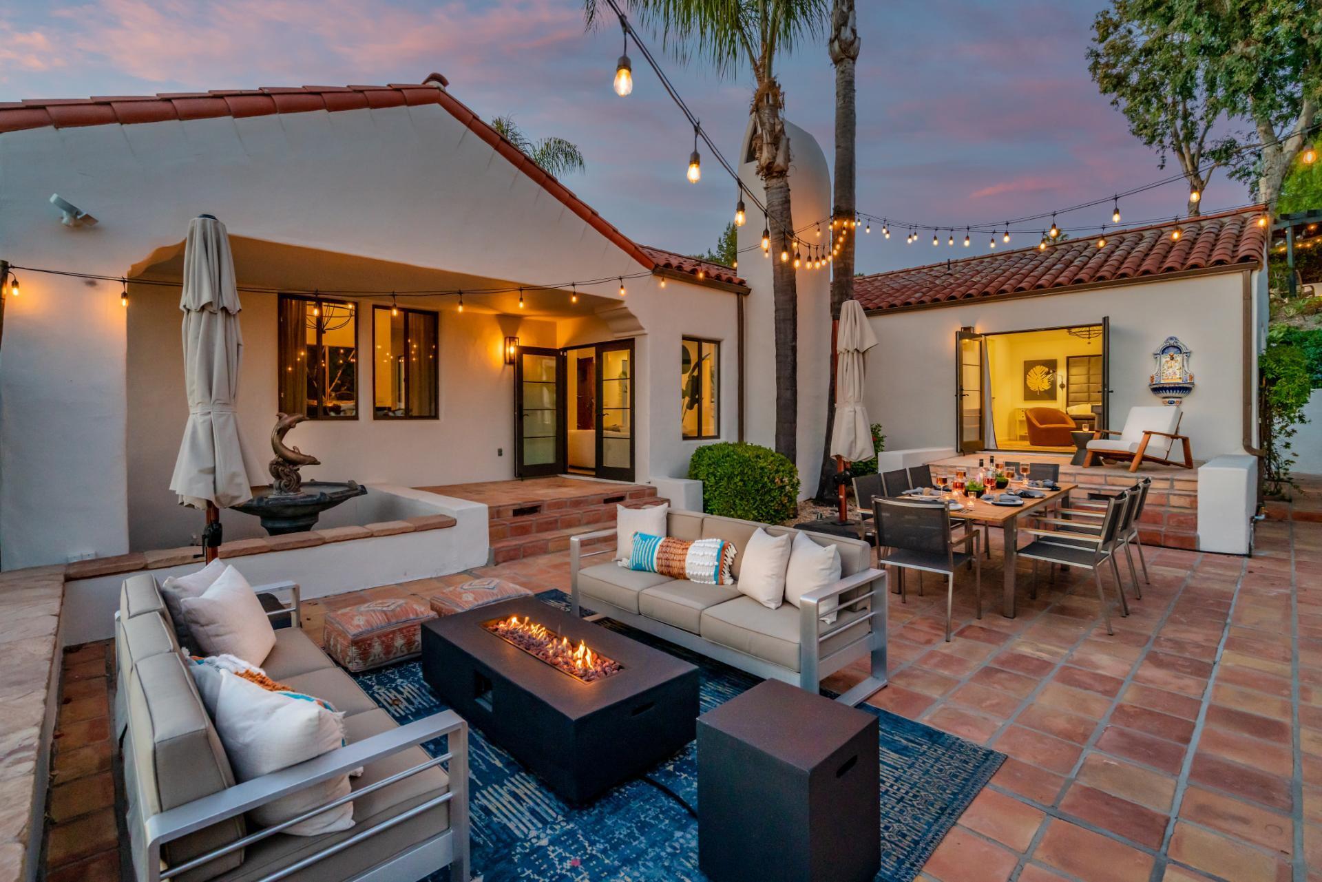 1910 Barker Pass Road Santa Barbara, CA 93108 - Photo 31 of 41 a view of a patio with couches table and chairs