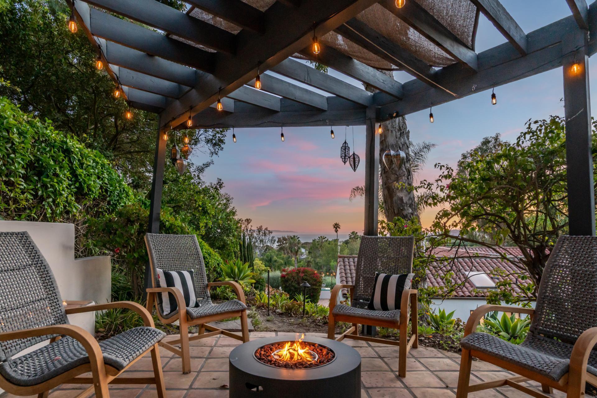 1910 Barker Pass Road Santa Barbara, CA 93108 - Photo 36 of 41 a view of a porch with furniture and a fire pit