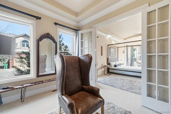 a living room with furniture rug and a window