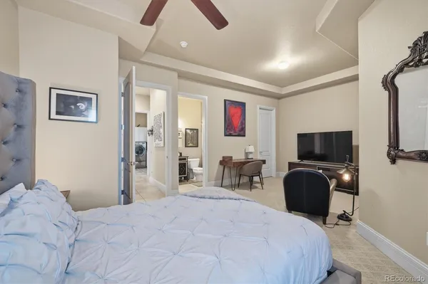 a bedroom with a bed and furniture