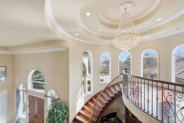 workspace with wooden floor and chandelier
