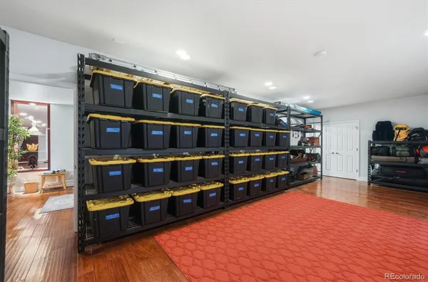a view of a livingroom with furniture and wooden floor