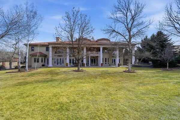 a view of a roof deck with wooden floor and fence