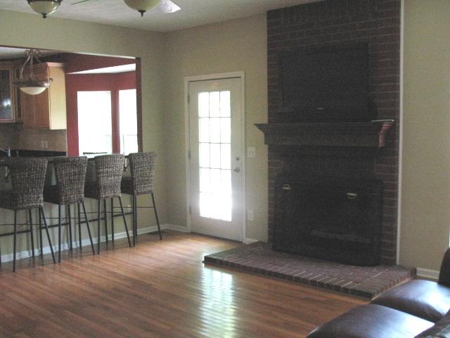 7435 Lebanon Road Mount Juliet, TN 37122 - Photo 7 of 20 Great room with gas fireplace. The TV over fireplace remains! Door opens up on huge deck....extremely convenient for cook-out entertainment!