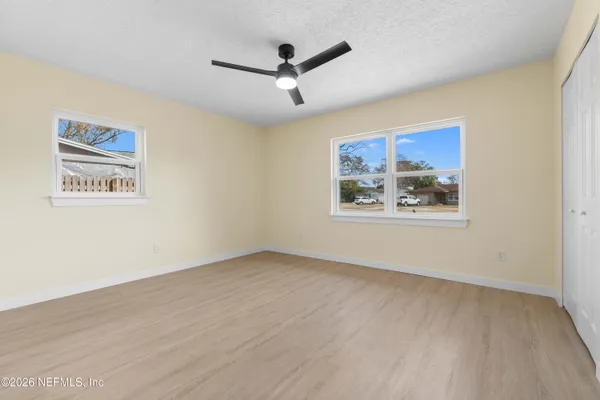 a view of a ceiling fan in a room