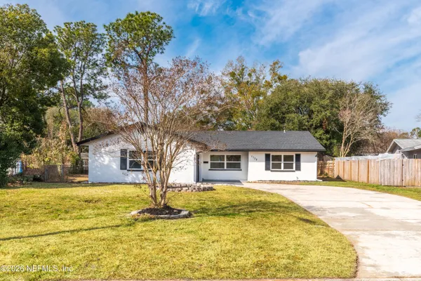 a house view with a swimming pool