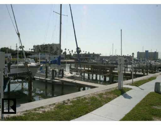 317 Rex Place, Unit F Madeira Beach, FL 33708 - Photo 1 of 1 Exterior Front - Maderia Beach Yacht Club Waterfront