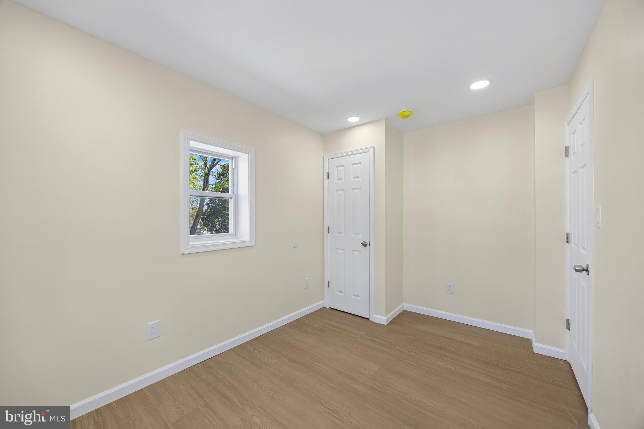 1051 Springfield Road Darby, PA 19023 - Photo 14 of 24 a view of an empty room with a window