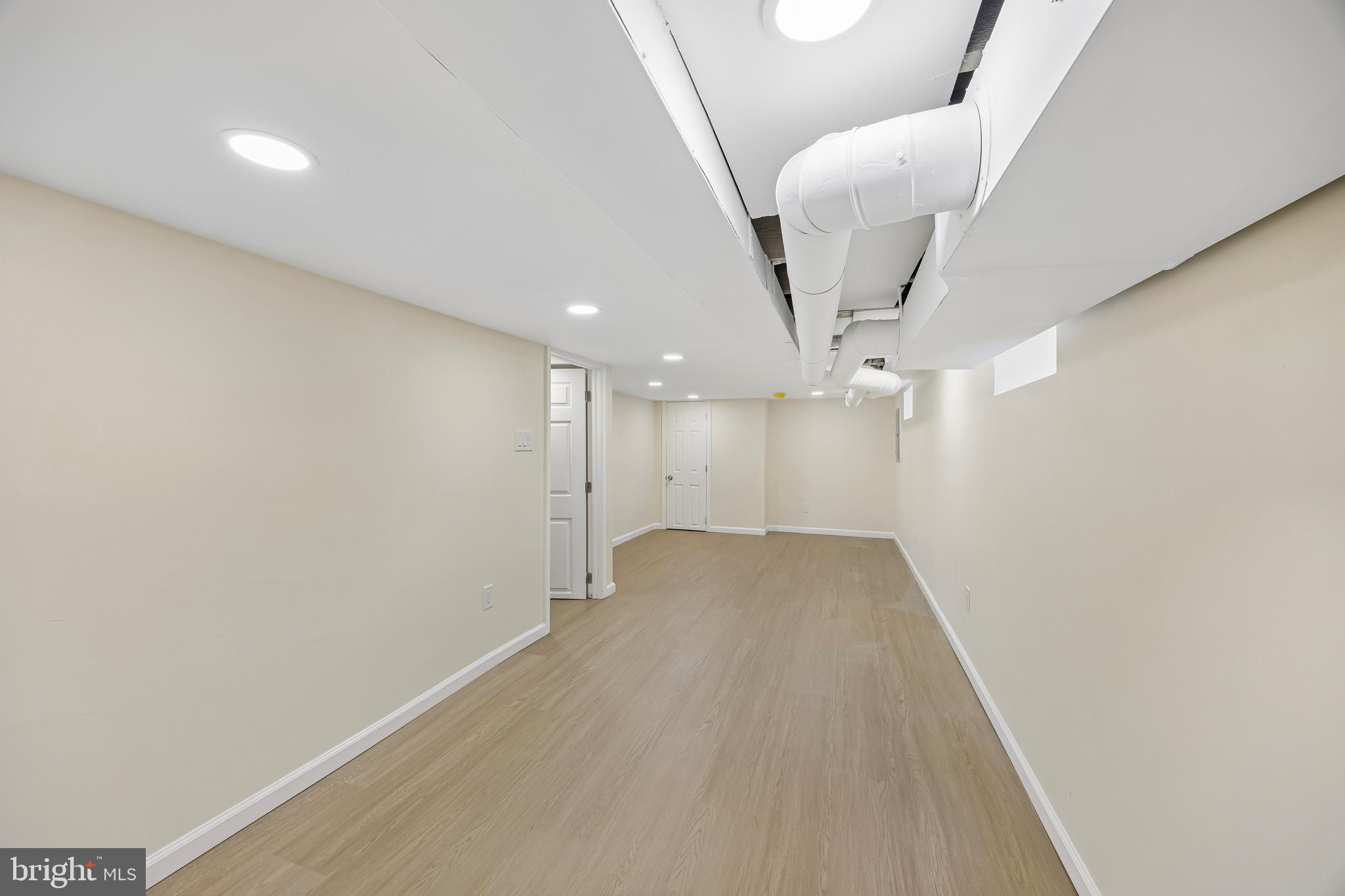 1051 Springfield Road Darby, PA 19023 - Photo 21 of 24 a view of a big room with a ceiling fan