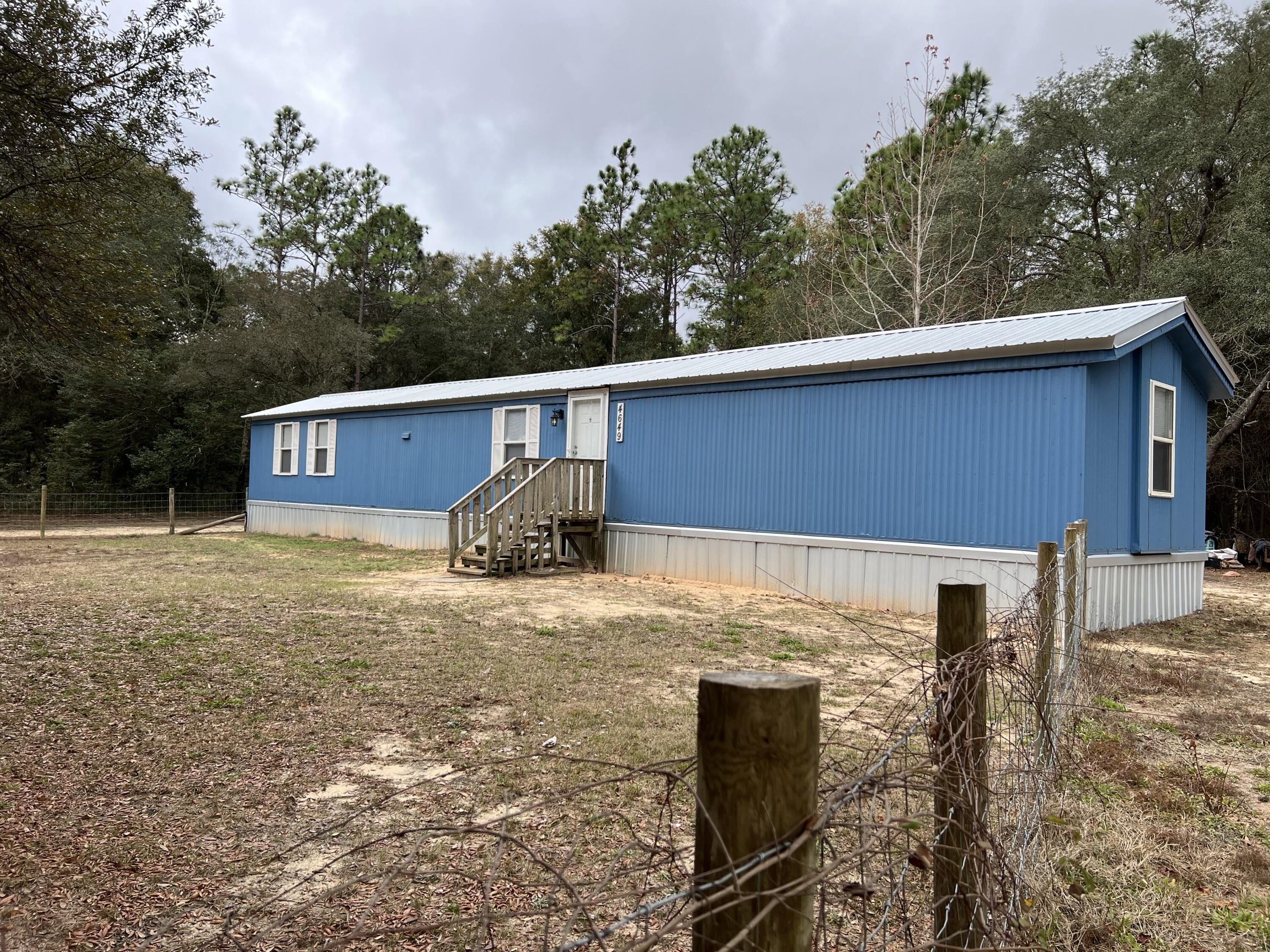 4649 Wilkerson Bluff Road Holt, FL 32564 - Photo 2 of 23 IMG_2311