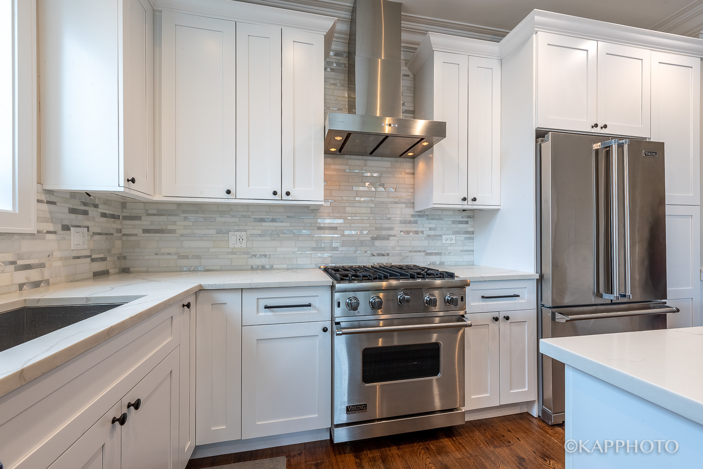 1430 West Fillmore Street, Unit 2W Chicago, IL 60607 - Photo 11 of 27 a kitchen with appliances cabinets and a sink