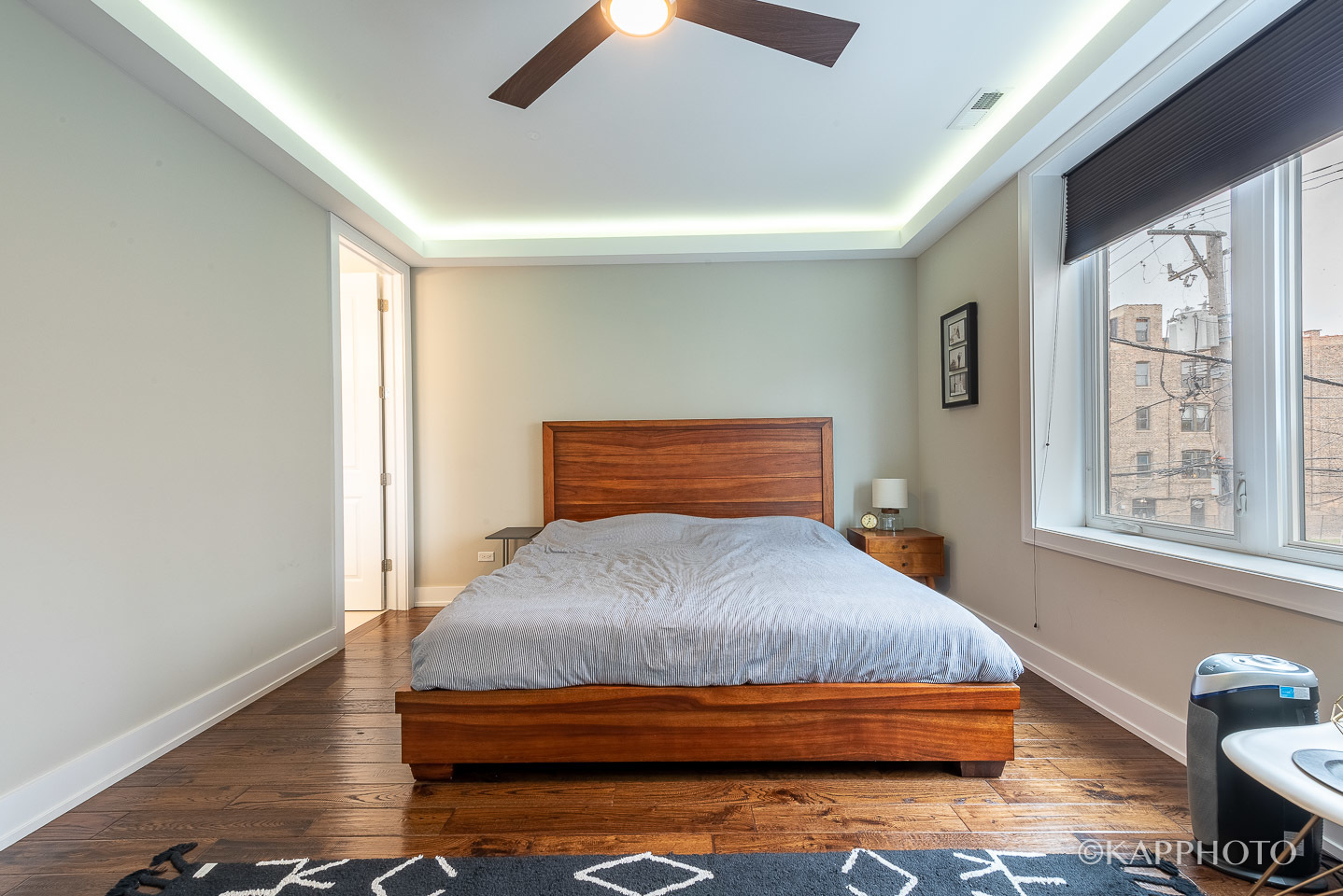 1430 West Fillmore Street, Unit 2W Chicago, IL 60607 - Photo 15 of 27 a bedroom with bed and window