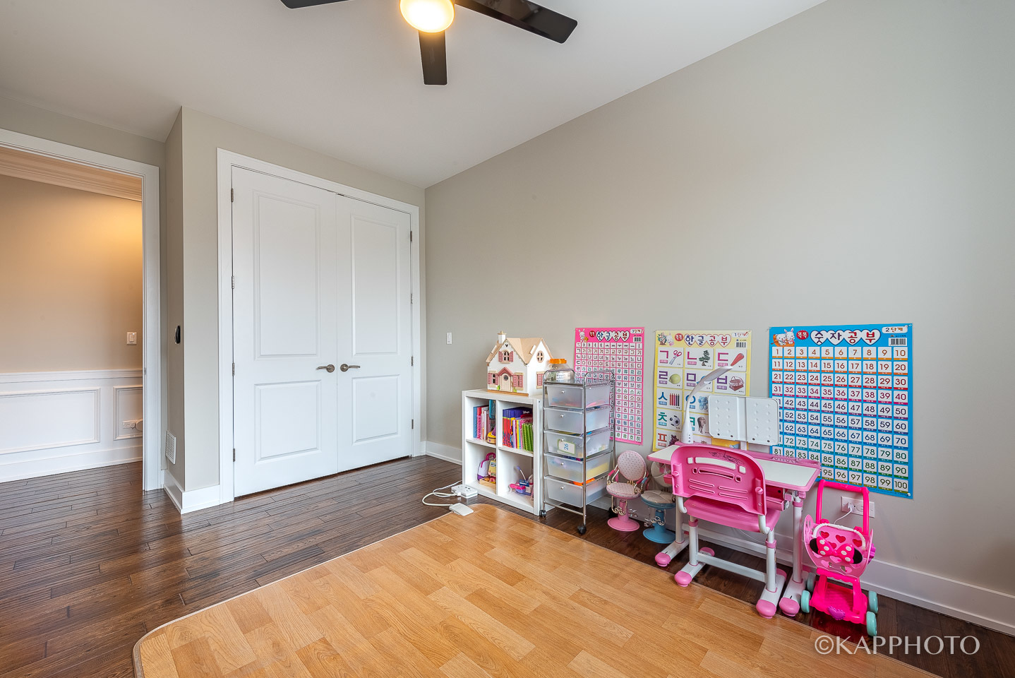 1430 West Fillmore Street, Unit 2W Chicago, IL 60607 - Photo 17 of 27 a bedroom with furniture and a book shelf