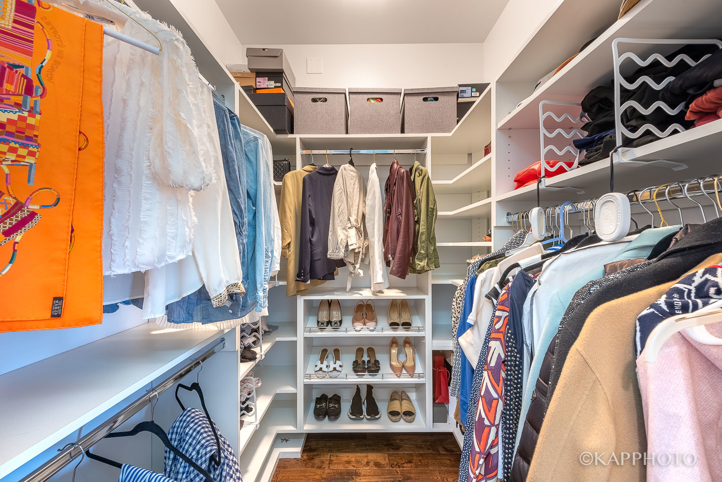 1430 West Fillmore Street, Unit 2W Chicago, IL 60607 - Photo 19 of 27 a view of walk in closet with clothes and shoes