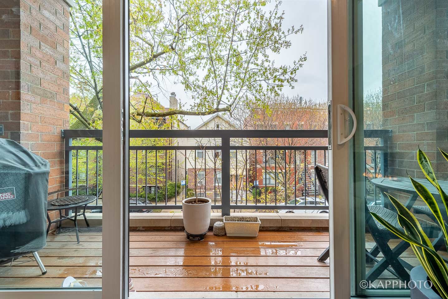 1430 West Fillmore Street, Unit 2W Chicago, IL 60607 - Photo 26 of 27 a view of living room with furniture and garden view