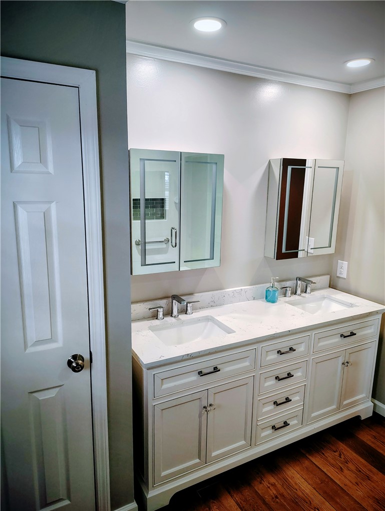 1809 Busby Road Anderson, SC 29626 - Photo 20 of 43 This sleek bathroom features a double vanity with ample storage and modern fixtures.