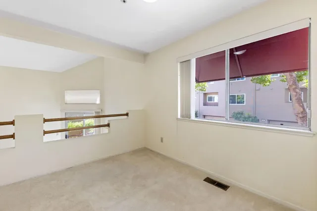 a room with furniture and a window