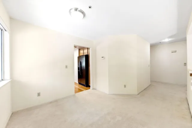 a view of a room with an empty space