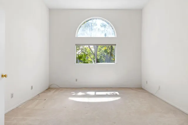 an empty room with a window
