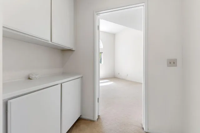 a view of small space with wooden floor