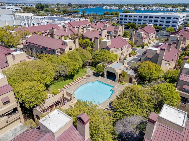 an aerial view of a houses with outdoor space