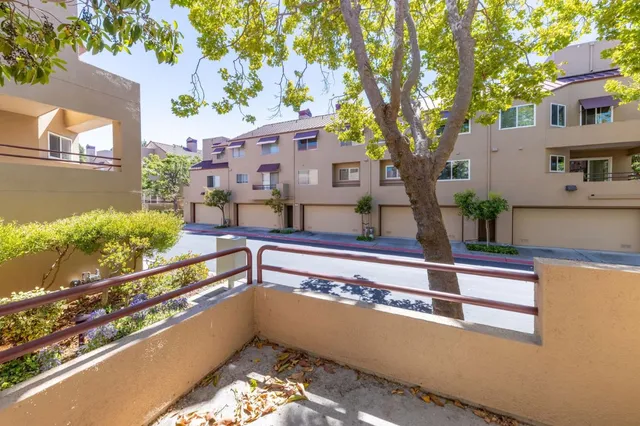 a view of swimming pool with a outdoor seating