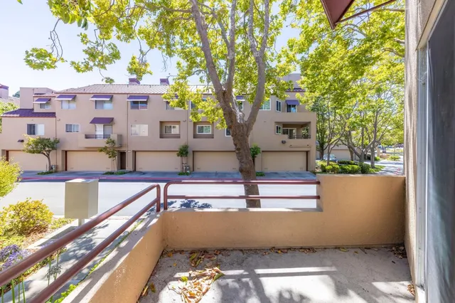 a view of house with a swimming pool