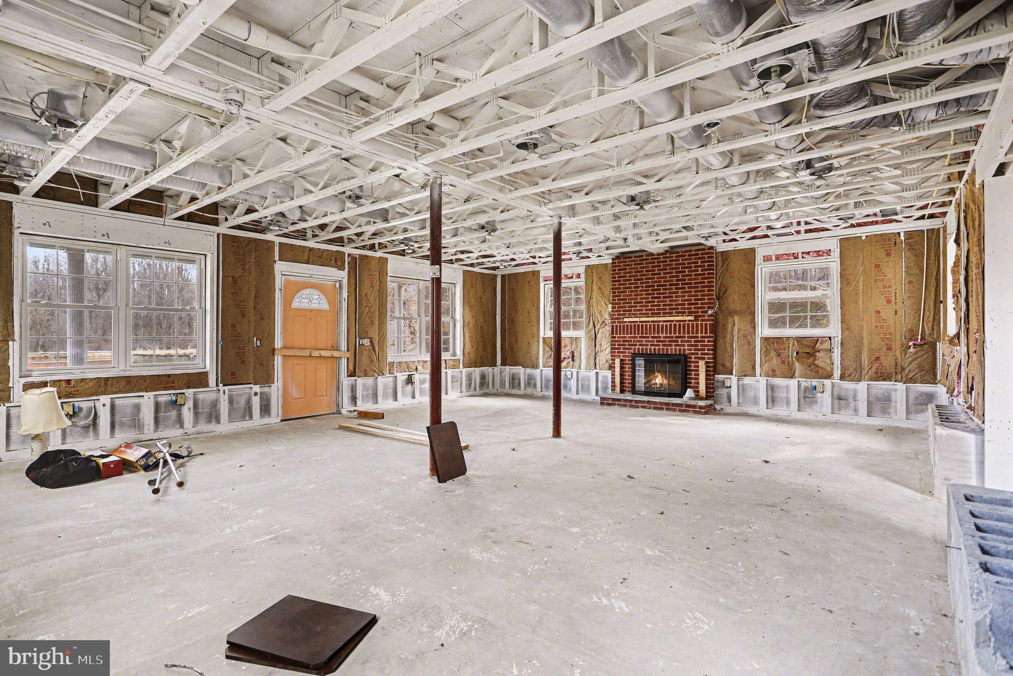 10301 Mckinstry Mill Road New Windsor, MD 21776 - Photo 15 of 43 Lower level family room area with walkout