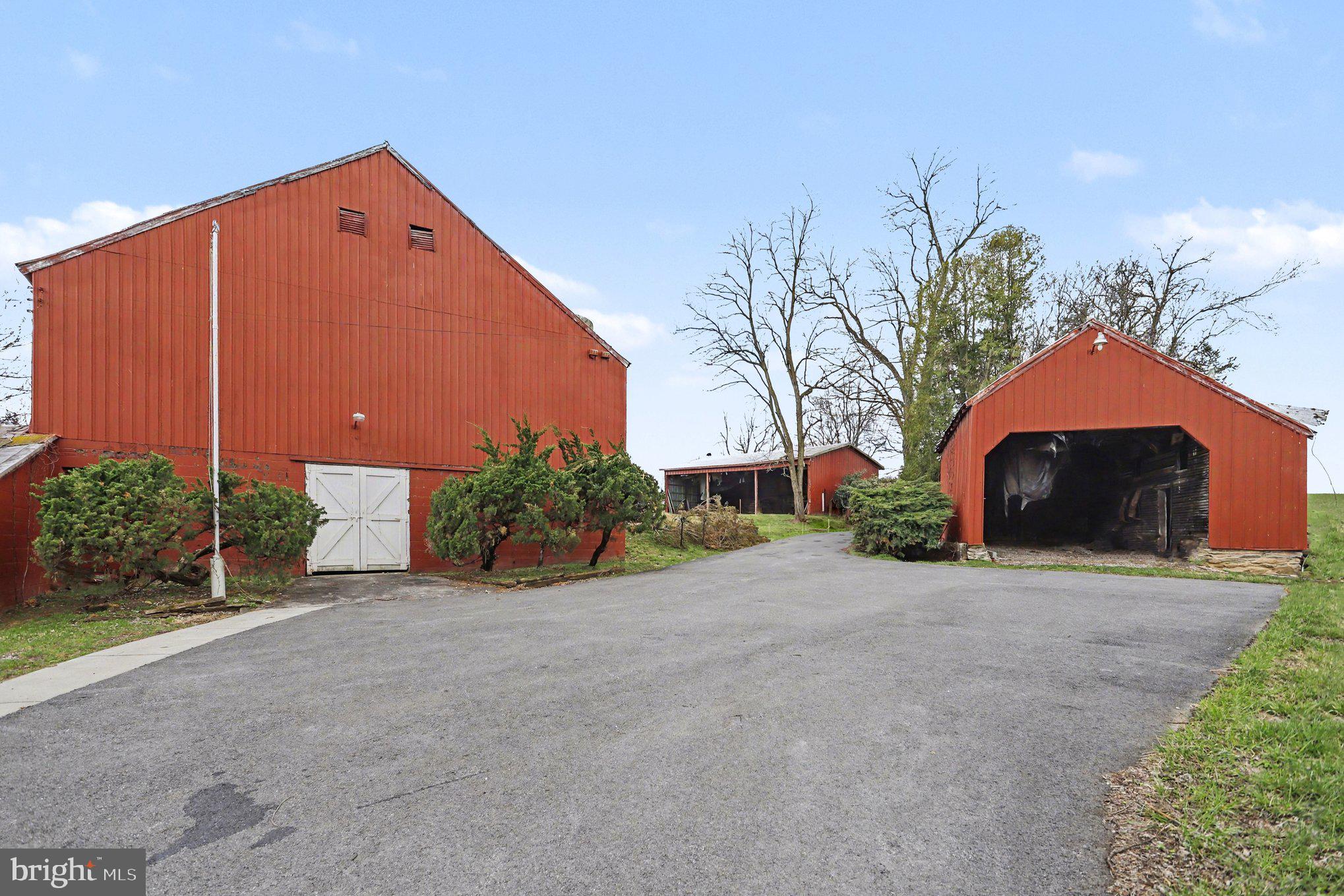 10301 Mckinstry Mill Road New Windsor, MD 21776 - Photo 23 of 43 Side view bank barn and outbuildings