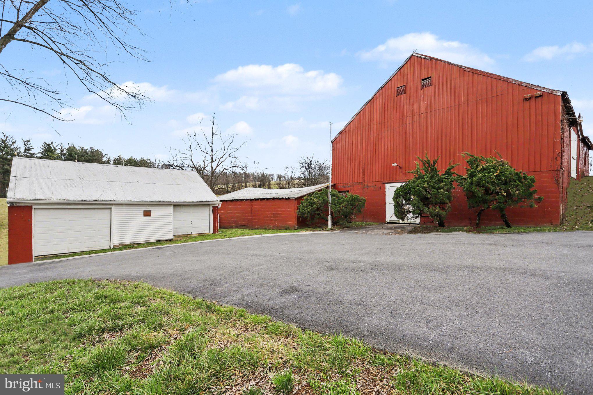 10301 Mckinstry Mill Road New Windsor, MD 21776 - Photo 24 of 43 Detached garage and bank barn side entry