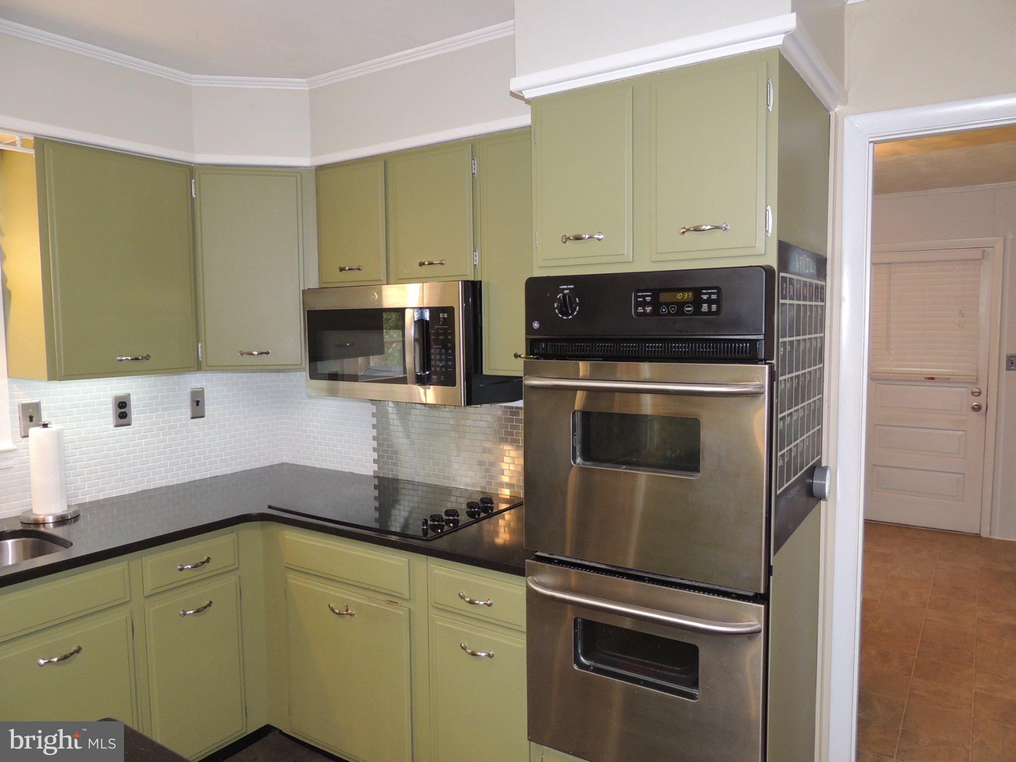 5838 Oklahoma Road Sykesville, MD 21784 - Photo 11 of 72 Charming kitchen with modern flair.