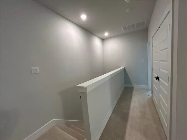 a bathroom with a sink and bathtub with toilet