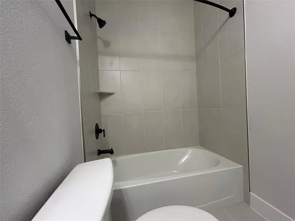 a view of staircase with lots of windows