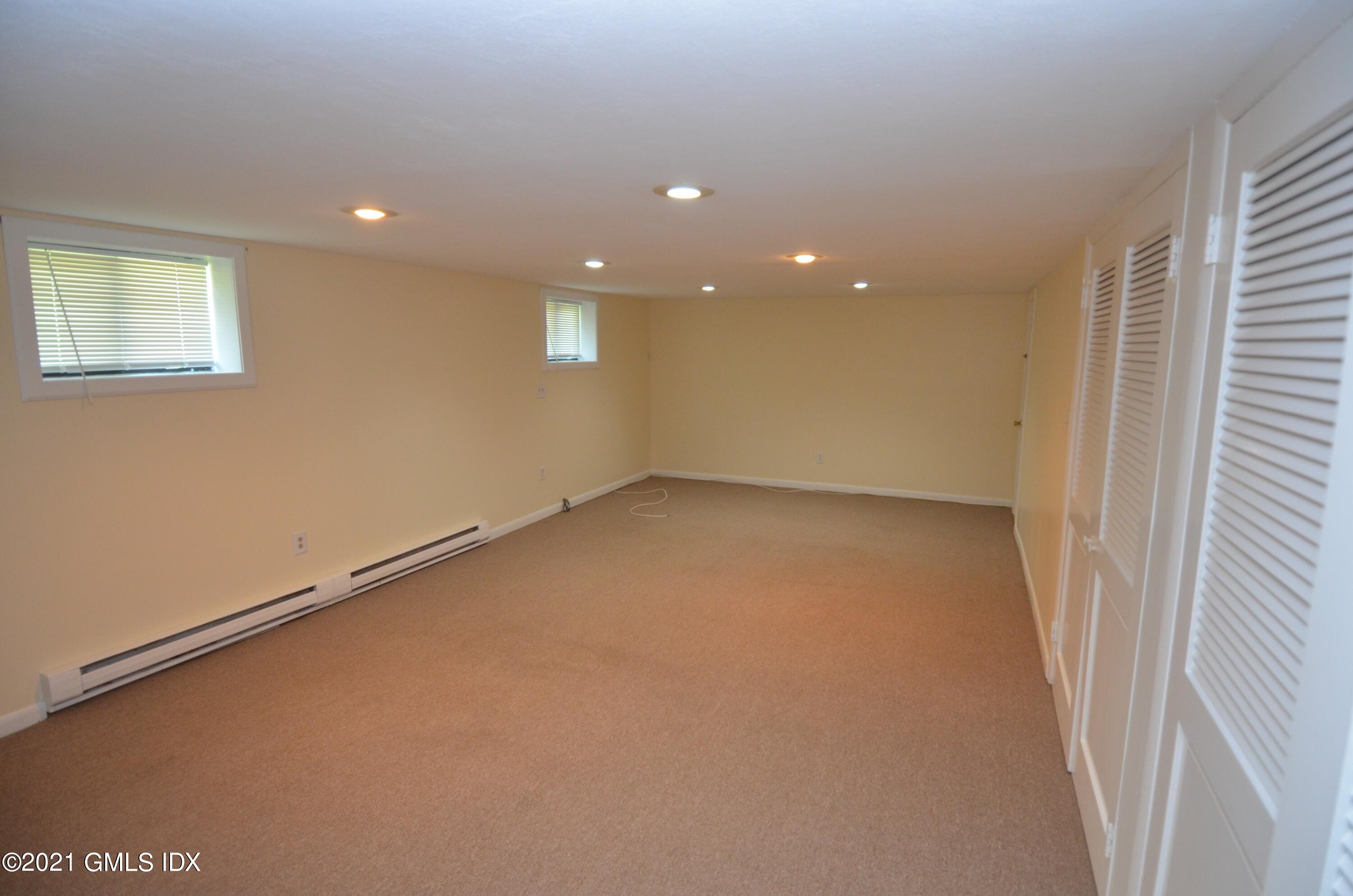 5 Ridge Place, Unit 1 Greenwich, CT 06831 - Photo 17 of 29 an empty room with a workbench